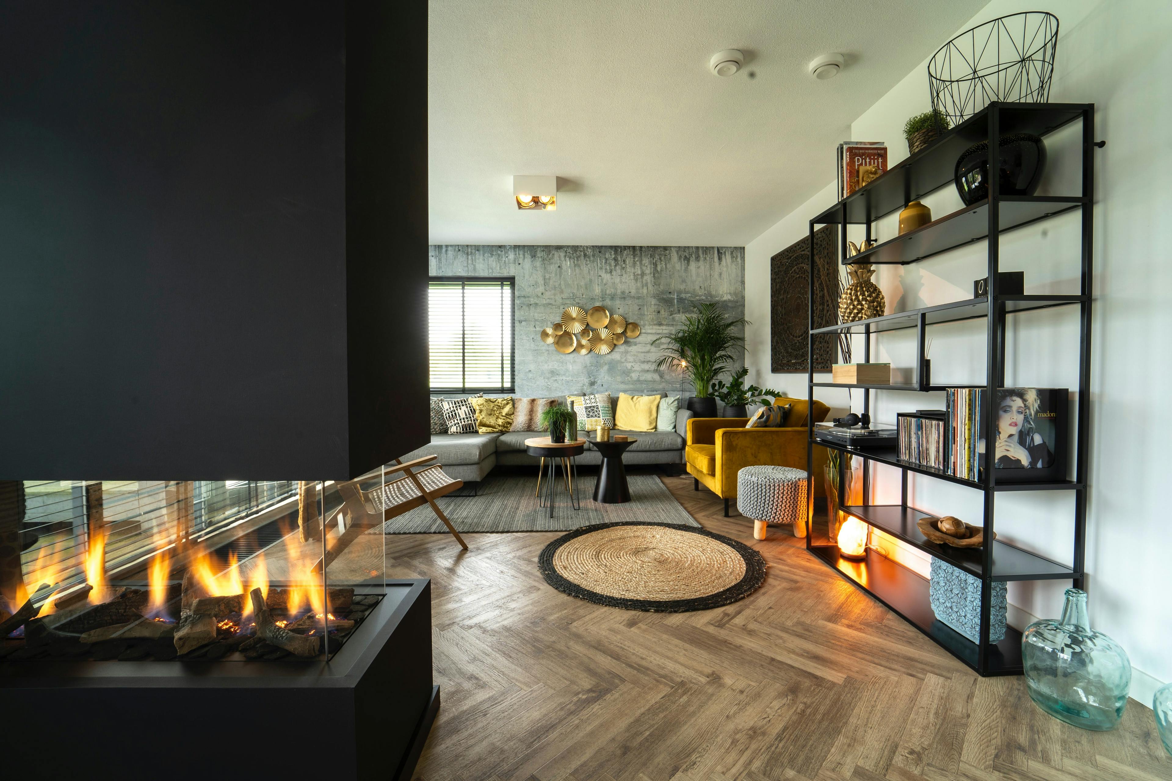 Home interior with wooden floors and fireplace